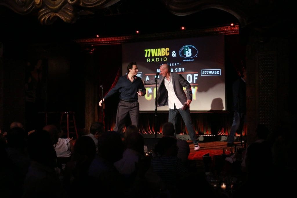 Rob Magnotti Comedian Impressionist Actor on stage with radio host Bernard McGuirk , at the 77 WABC Radio first annual Bernie and Sid Night of Comedy at The Cutting Room NYC New York City