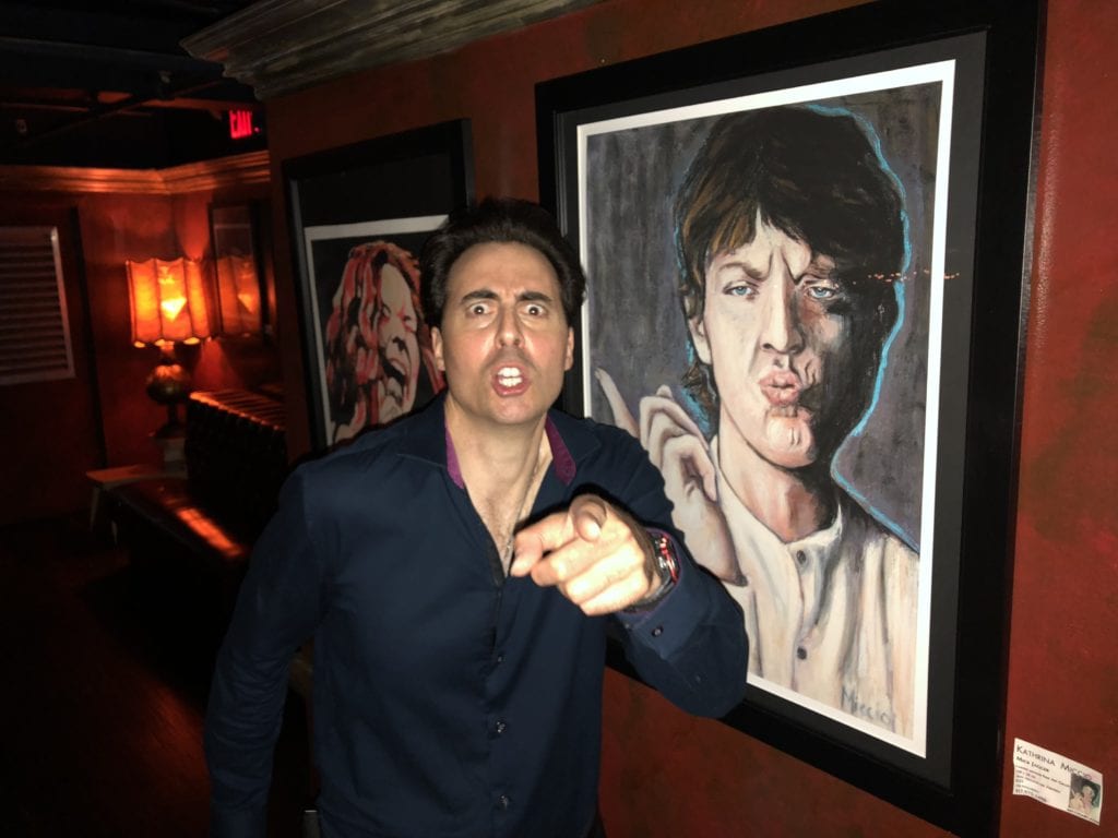 Rob Magnotti Comedian Impressionist Actor doing his Mick Jagger impression at the 77 WABC Radio Bernie and Sid Night of Comedy at The Cutting Room NYC New York City